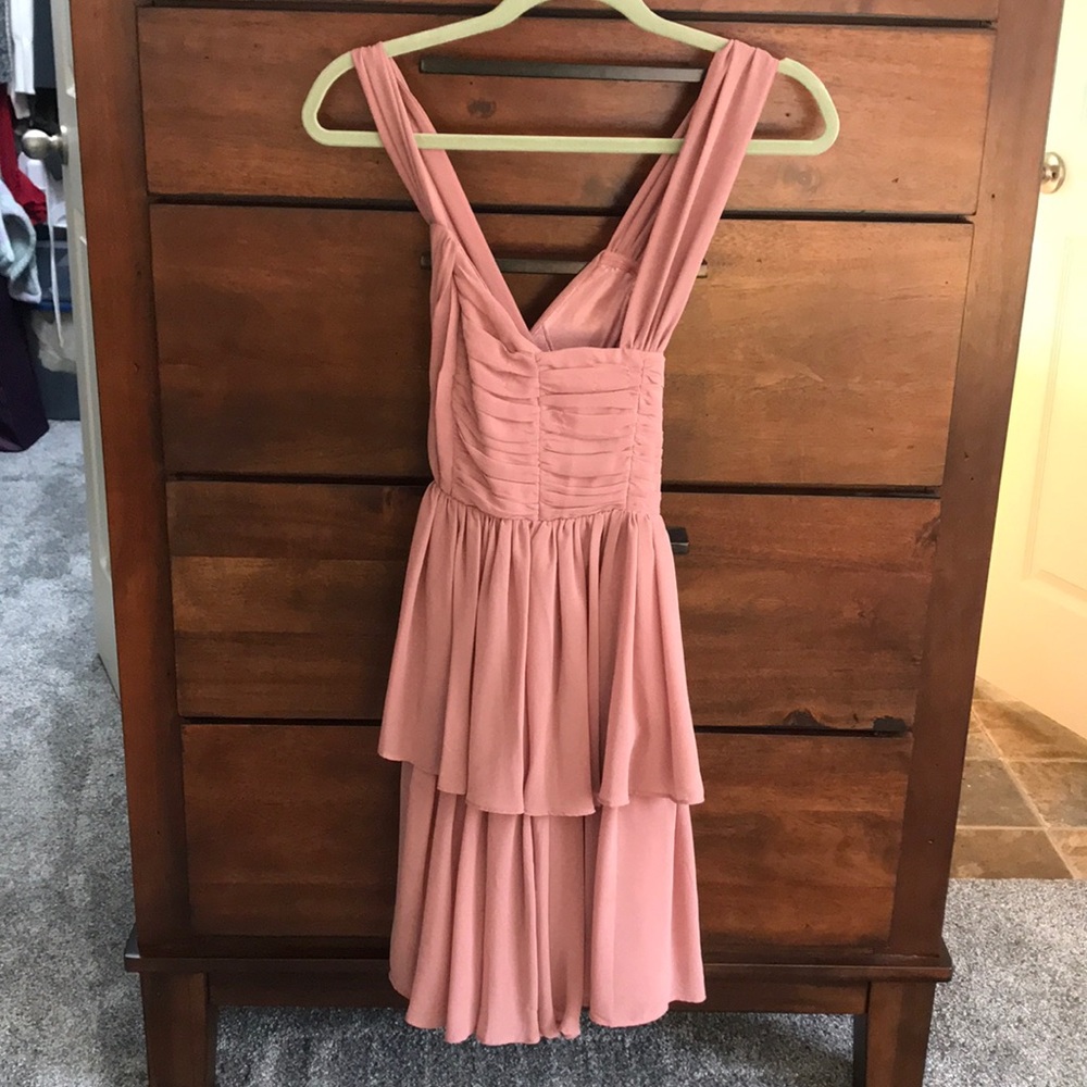 Blush tiered bridesmaid dress with deep neckline